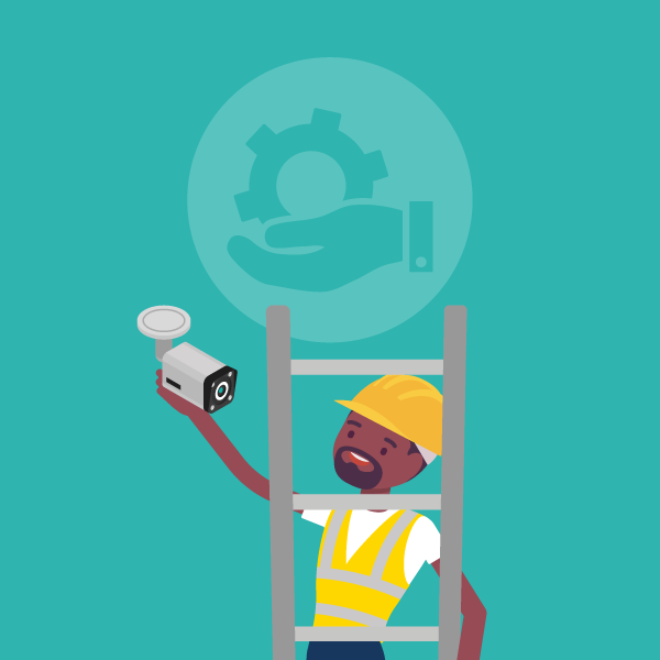 Man on a ladder fixing CCTV camera